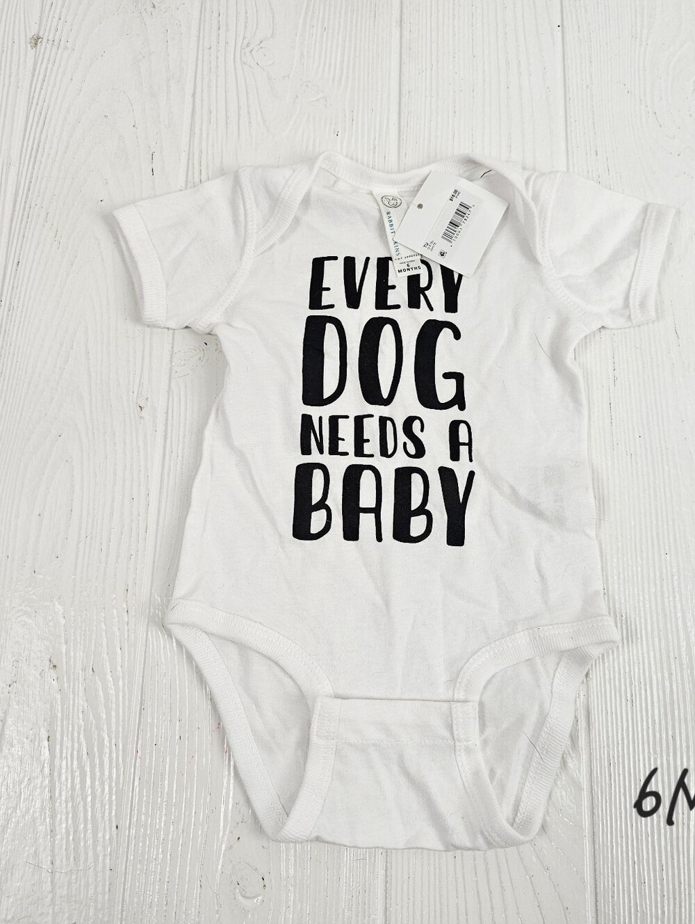 Every Dog Needs A Baby Bodysuit